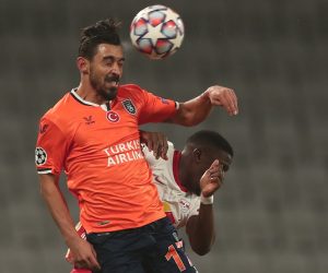 epa08857540 Irfan Can Kahveci (front) of Basaksehir in action against Nordi Mukiele (back) of Leipzig during the UEFA Champions League group H soccer match between Istanbul Basaksehir and RB Leipzig in Istanbul, Turkey, 02 December 2020.  EPA/SEDAT SUNA