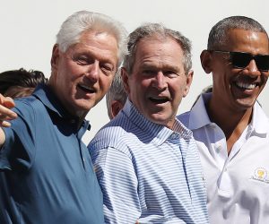 epa08859435 (FILE) - Former US Presidents Bill Clinton (L), George W. Bush (C) and Barack Obama during opening ceremonies for the 2017 Presidents Cup at Liberty National Golf Club in Jersey City, New Jersey, USA, 28 September 2017 (reissued 03 December 2020). According to media reports, the three former presidents will volunteer to get a Covid-19 vaccination publicly in order to promote the safety of the upcoming coronavirus vaccine.  EPA/ANDREW GOMBERT *** Local Caption *** 53796188