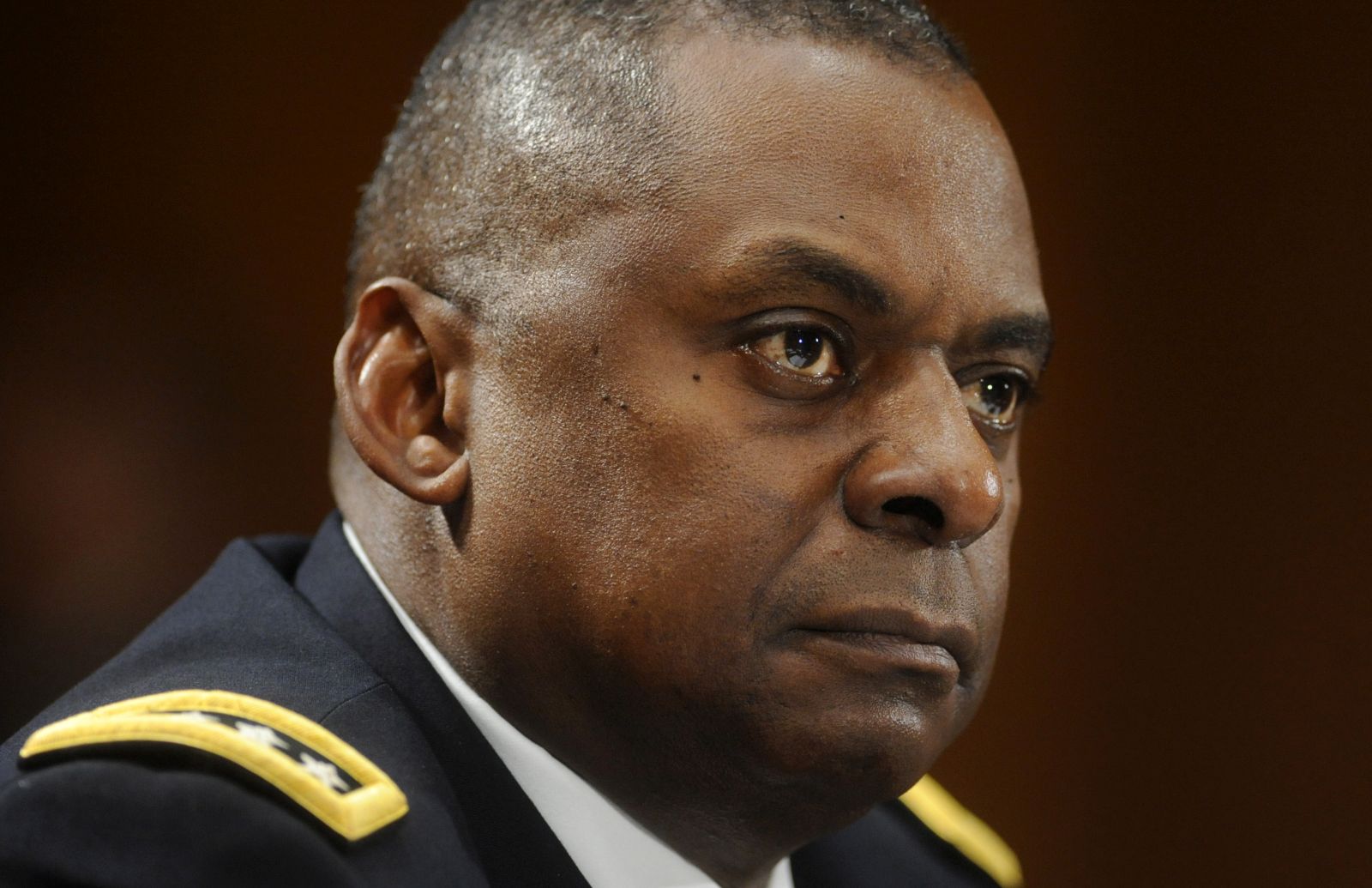 epa08869577 (FILE) - General Lloyd James Austin III, commanding general of United States Forces - Iraq, appears before the US Senate Armed Services Committee hearing on US policy towards Iraq, on Capitol Hill in Washington DC, USA, 03 February 2011 (reissued 08 December 2020). According to media reports on 08 December, US President-elect Joe Biden picked retired General Lloyd James Austin III to be his Defense Secretary. If confirmed by the Senate, Austin will be the first African American to hold the position.  EPA/MICHAEL REYNOLDS