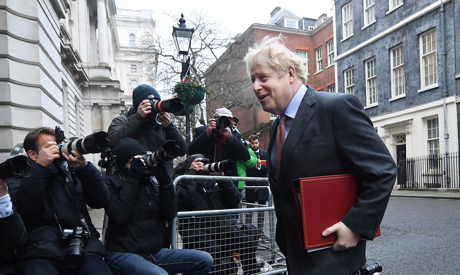epa08870257 British Prime Minister Boris Johnson departs 10 Downing Street in London, Britain, 08 December 2020. British Prime Minister Boris Johnson is holding a cabinet meting before heading to Brussels for a crucial Brexit talks.  EPA/ANDY RAIN