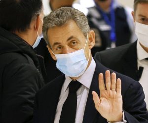 epa08874538 Former French president Nicolas Sarkozy (C) arrives at the court for his trial on corruption charges in the so-called 'wiretapping affair' in Paris, France, 10 December 2020. In 2013, Nicolas Sarkozy was using a false name, Paul Bismuth, to make phone calls to his lawyer, Thierry Herzog, about the decision that the Court of Cassation was about to take regarding the seizure of presidential diaries in a separate case. The trial is due to run from 23 November to 10 December 2020.  EPA/YOAN VALAT