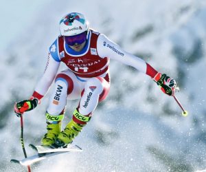 epa08880927 Urs Kryenbuehl of Switzerland speeds down the slope during the Men's Downhill race at the FIS Alpine Skiing World Cup in Val d'Isere, France, 13 December 2020.  EPA/GUILLAUME HORCAJUELO
