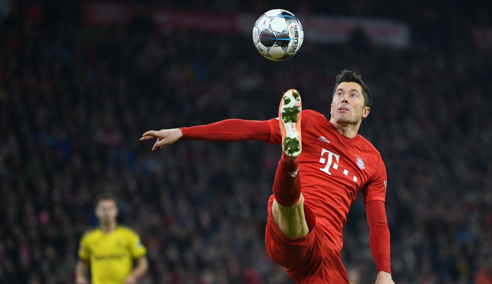 epa08890528 (FILE) - Bayern Munich's Robert Lewandowski in action during the German Bundesliga soccer match between Bayern Munich and Borussia Dortmund in Munich, Germany, 09 November 2019 (re-issued on 17 December 2020). Polish striker Robert Lewandowski has been named The Best FIFA Men's Player during the virtual Best FIFA Football Awards 2020 on 17 December 2020.  EPA/PHILIPP GUELLAND CONDITIONS - ATTENTION: The DFL regulations prohibit any use of photographs as image sequences and/or quasi-video.