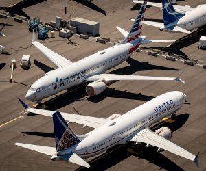 epa08892946 (FILE) - An aerial view of Boeing 737 Max 8 aircraft owned by American Airlines and United Airlines parked at Boeing Field in Seattle, Washington, USA, 21 July 2019 (reissued 19 December 2020). According to US Senate investigators Boeing officials inappropriately coached test pilots during the 737 Max aircraft recertification process.  EPA/GARY HE   EDITORIAL USE ONLY *** Local Caption *** 55830723