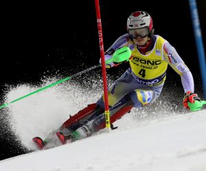 epa08899924 Henrik Kristoffersen of Norway clears a gate during the first run of the Men's Slalom race at the FIS Alpine Skiing World Cup in Madonna di Campiglio, Italy, 22 December 2020.  EPA/ANDREA SOLERO