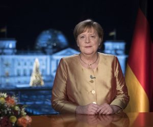 epa08911973 German Chancellor Angela Merkel poses for photographs after the television recording of her annual New Year's speech at the chancellery in Berlin, Germany, 30 December 2020 (Issued 31 December 2020).  EPA/Markus Schreiber / POOL