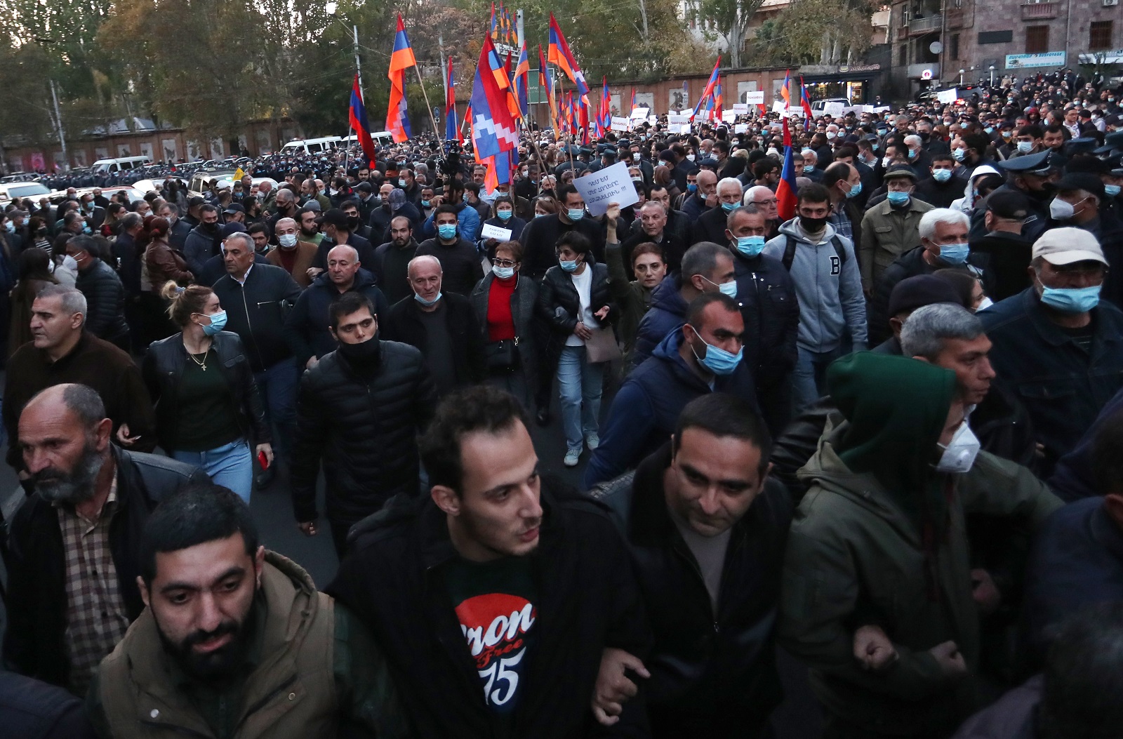 epa08816129 Armenian people attend an opposition rally in Yerevan, Armenia, 12 November 2020. Protesters  demanded the resignation of Armenian Prime Minister Nikol Pashinyan and his government. The unrest  and protest erupted in Yerevan on 10 November 2020 after Armenian Prime Minister and Presidents of Azerbaijan and Russia signed a trilateral statement announcing the halt of ceasefire and all military operations in the Nagorno-Karabakh conflict zone.  EPA/VAHRAM BAGHDASARYAN /PHOTOLURE MANDATORY CREDIT