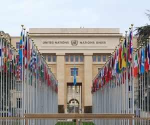 GENEVA, SWITZERLAND - December 17, 2017: Allee des Nations (Avenue of Nations) of the United Nations Palace in Geneva, with the flags of the member countries.