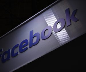 epa08873285 (FILE) - A Facebook logo on a stand during the Vivatech startups and innovation fair, in Paris, France, 16 May 2019 (Reissued 09 December 2020). The Federal Trade Commision (FTC), with a coalition of attorneys general of 46 states with Washington DC and Guam, sued Facebook on 09 December, alleging that Facebook is illegally maintaining a social network monopoly through anticompetitive conduct.  EPA/Julien de Rosa *** Local Caption *** 55197924
