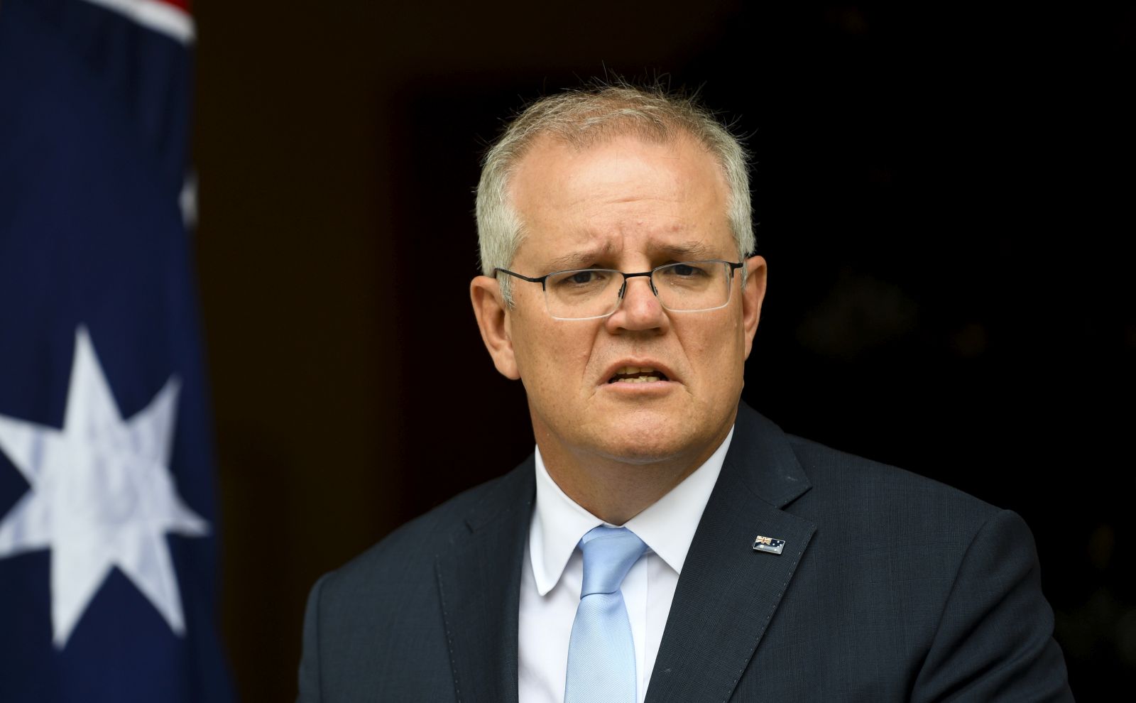 epa08890947 Australian Prime Minister Scott Morrison speaks to the media during a press conference at Parliament House in Canberra, Australia, 18 December 2020. Morrison spoke about the Cabinet reshuffle that occurred on the same day.  EPA/LUKAS COCH  AUSTRALIA AND NEW ZEALAND OUT