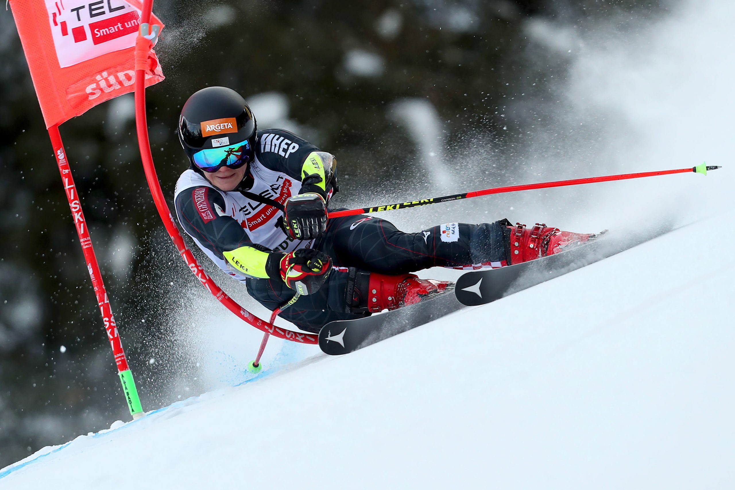 epa08895301 Filip Zubcic of Croatia clears a gate during the first run of the Men's Giant Slalom race at the Alpine Skiing World Cup in Alta Badia, Italy, 20 December 2020.  EPA/ANDREA SOLERO