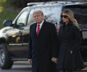 epa08901877 US President Donald J. Trump and First lady Melania Trump (R) depart the White House, in Washington, DC, USA, 23 December 2020, headed out to Mar-a-Lago in Palm Beach, Florida.  EPA/Chris Kleponis / POOL