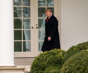 epa08912956 US President Donald J. Trump walks down the colonnade after returning from his Florida vacation early at the White House, Washington, DC, USA, 31 December 2020.  EPA/KEN CEDENO / POOL