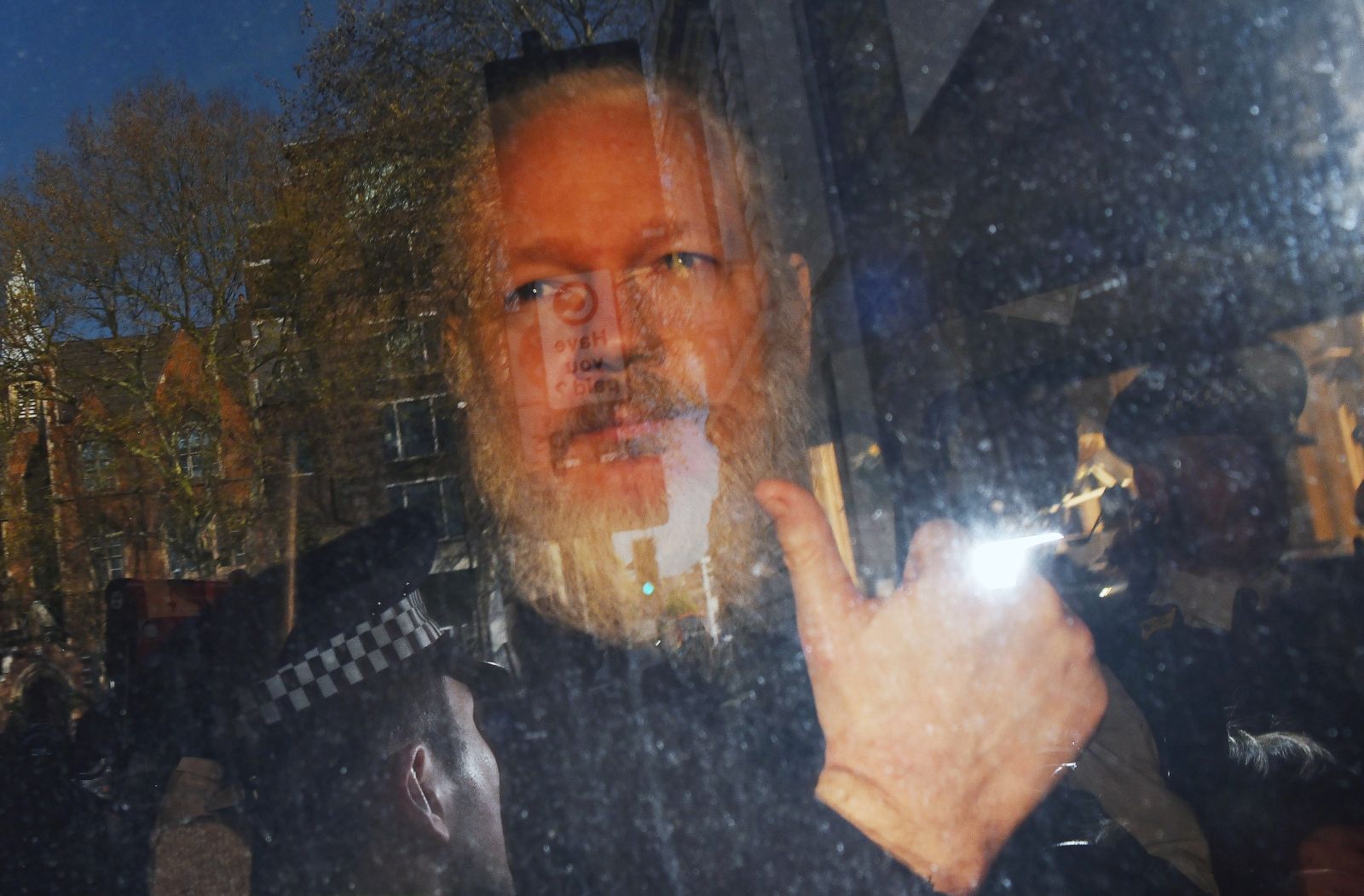 epa08916193 (FILE) - WikiLeaks co-founder Julian Assange arrives at Westminster Magistrates Court in London, Britain, 11 April 2019 (reissued 03 January 2021). London's Old Bailey courthouse will deliver the decision on 04 January 2021, if Julian Assange can be extradited from Britain to the US to face espionage charges over the publication of secret US military documents.  EPA/STRINGER