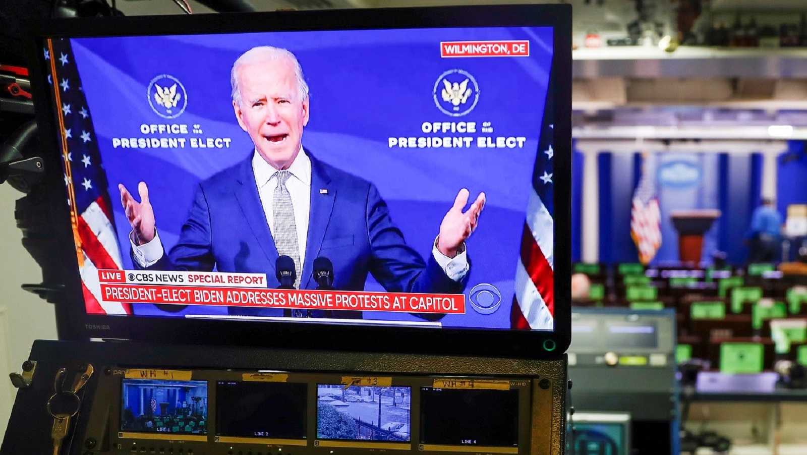 epa08923545 US President-elect Joe Biden delivering remarks about the violence at the US Capitol is seen on a television screen in the Brady press briefing room at the White House in Washington, DC, USA, 06 January 2021. Various groups of Trump supporters have broken into the US Capitol and rioted as Congress prepares to meet and certify the results of the 2020 US Presidential election.  EPA/SHAWN THEW
