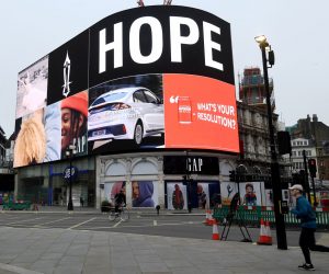 epa08930043 An advertisement showing the word "Hope" is on display at Piccadilly Circus in London, Britain, 10 January 2021. England has entered the third lockdown since the start of the pandemic, people will only be able to leave their houses for limited reasons.  EPA/FACUNDO ARRIZABALAGA
