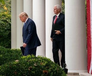 epa08931191 (FILE) - US President Donald J. Trump (L) and Vice President Mike Pence arrive to give an update on the Nation's Coronavirus Testing Strategy, in the Rose Garden of the White House, in Washington, DC, USA, 28 September 2020 (reissued 11 January 2021). According to reports on 11 January 2021, US House Speaker Nancy Pelosi urged US Vice President Mike Pence to oust US President Trump by invoking the 25th amendment, or said the Democrats would move forward with an impeachment.  EPA/Ken Cedeno / POOL *** Local Caption *** 56378934