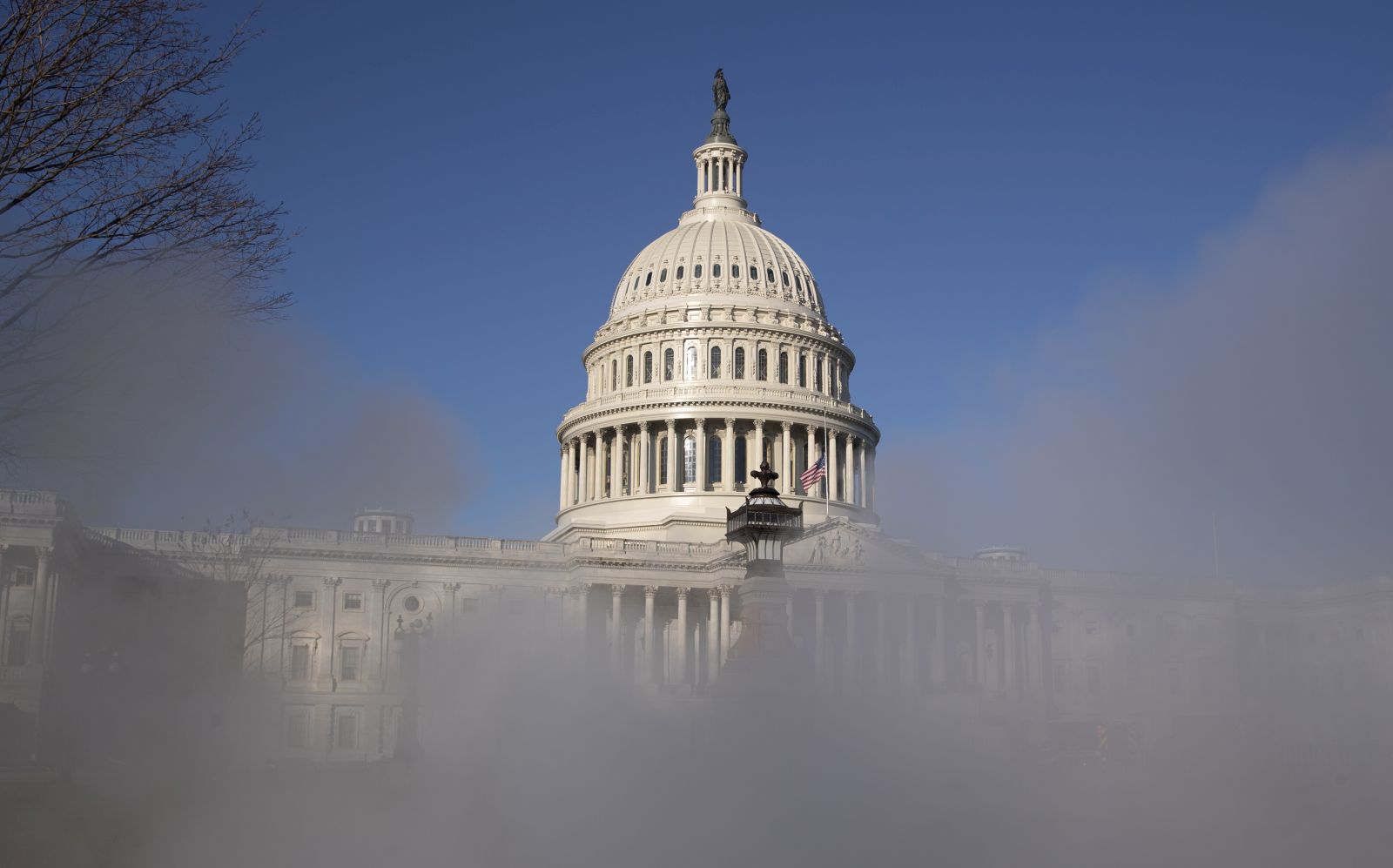 epa08933146 The US Capitol is seen behind steam in Washington, DC, USA, 12 January 2021. At least ten thousand troops of the National Guard will be deployed in Washington by the end of the week, with the possibility of five thousand more, to help secure the Capitol area ahead of more potentially violent unrest in the days leading up to the Inauguration of US President-elect Biden. Democrats are attempting to impeach incumbent US President Trump after he incited a mob of his supporters to riot on the US Capitol in an attempt to thwart Congress from certifying Biden's election victory.  EPA/MICHAEL REYNOLDS