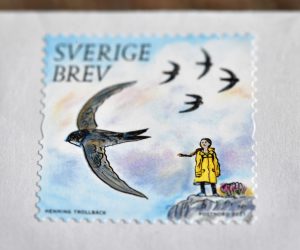 epa08936904 Swedish environmental activist Greta Thunberg appears on a postal stamp that is part of a series focusing on the environment, illustrated by Henning Trollback and released in Sweden, in Stockholm, Sweden, 14 January 2021.  EPA/ANDERS WIKLUND  SWEDEN OUT