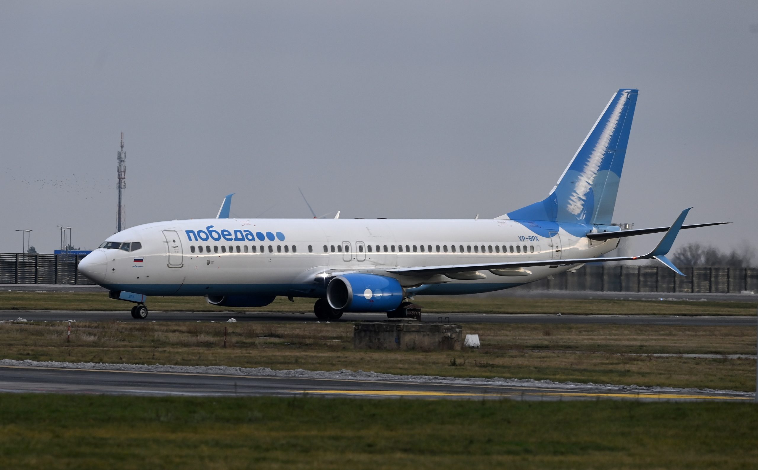 epa08943477 A Pobeda airlines plane, in which Russian opposition leader Alexei Navalny and his wife Yulia Navalnaya are to fly to Moscow, arrives at the Berlin Brandenburg International Airport BER in Schoenefeld, Germany, 17 January 2021. Navalny plans to return to Russia on a scheduled flight to Moscow later in the afternoon on 17 January. He was treated at the Charite hospital in Berlin since 22 August 2020 for being poisoned with a nerve agent from the Novichok group and was discharged from acute inpatient care on 22 September 2020.  EPA/FILIP SINGER