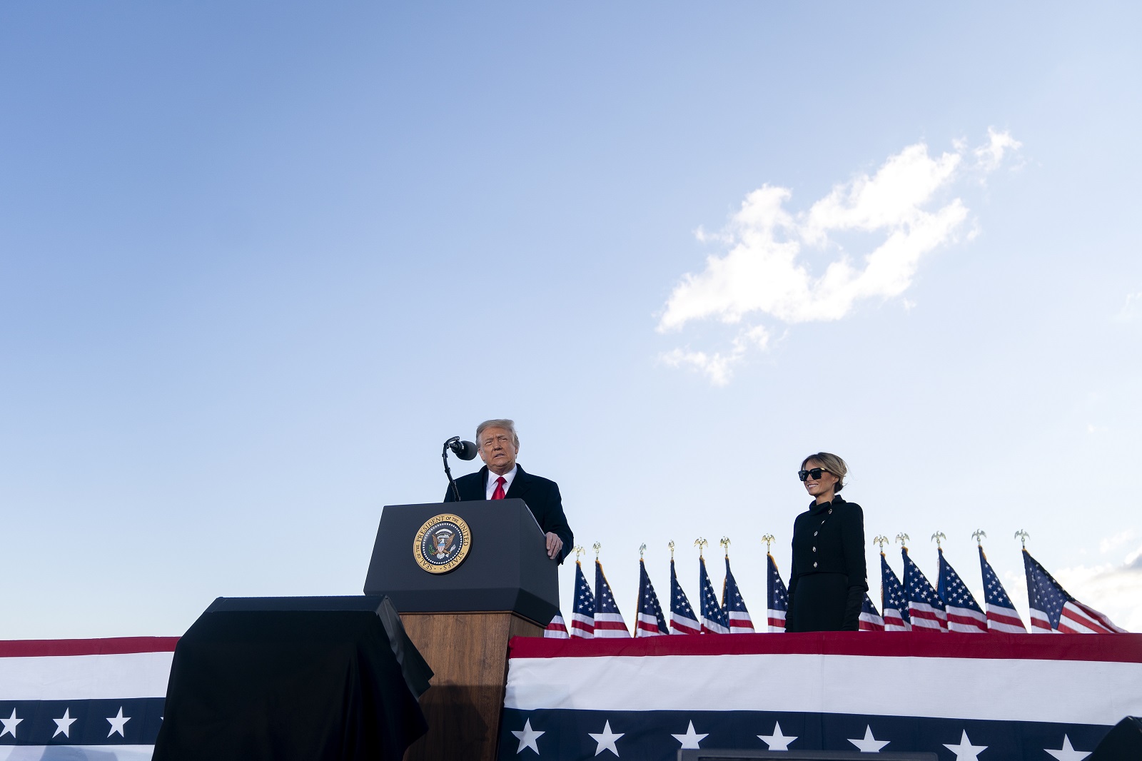 epa08952510 U.S. President Donald Trump speaks during a farewell ceremony at Joint Base Andrews, Maryland, U.S., on 20 January 2021. Trump departed Washington before the inauguration of Joe Biden as US President in Washington, DC, USA, 20 January 2021. Biden won the 03 November 2020 election to become the 46th President of the United States of America.  EPA/Stefani Reynolds / POOL