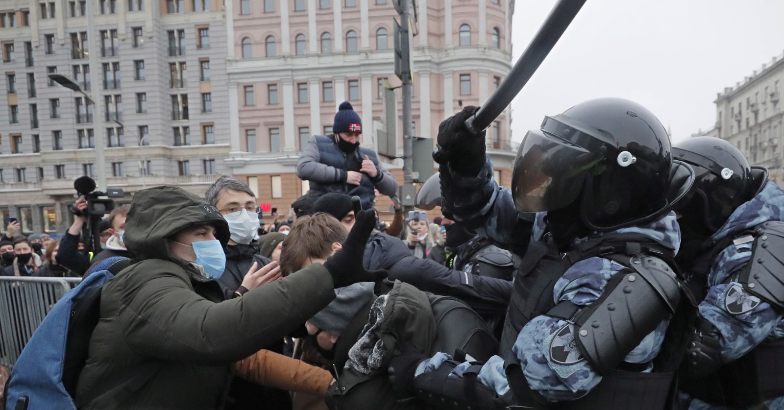 epa08960712 Russian special police units officers clash with protesters during an unauthorized protest in support of Russian opposition leader and blogger Alexei Navalny, in Moscow, Russia, 23 January 2021. Navalny was detained after his arrival to Moscow from Germany on 17 January 2021. A Moscow judge on 18 January ruled that he will remain in custody for 30 days following his airport arrest. Navalny urged Russians to take to the streets to protest. In many Russian cities mass events are prohibited due to an increasing number of cases of the COVID-19 pandemic caused by the SARS CoV-2 coronavirus.  EPA/MAXIM SHIPENKOV