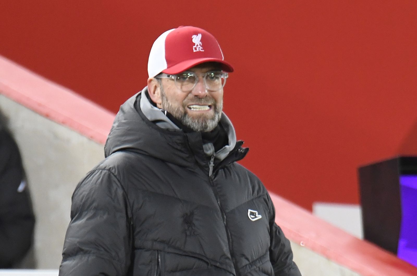 epa08956622 Liverpool's manager Juergen Klopp reacts during the English Premier League soccer match between Liverpool FC and Burnley FC in Liverpool, Britain, 21 January 2021.  EPA/Peter Powell / POOL EDITORIAL USE ONLY. No use with unauthorized audio, video, data, fixture lists, club/league logos or 'live' services. Online in-match use limited to 120 images, no video emulation. No use in betting, games or single club/league/player publications.