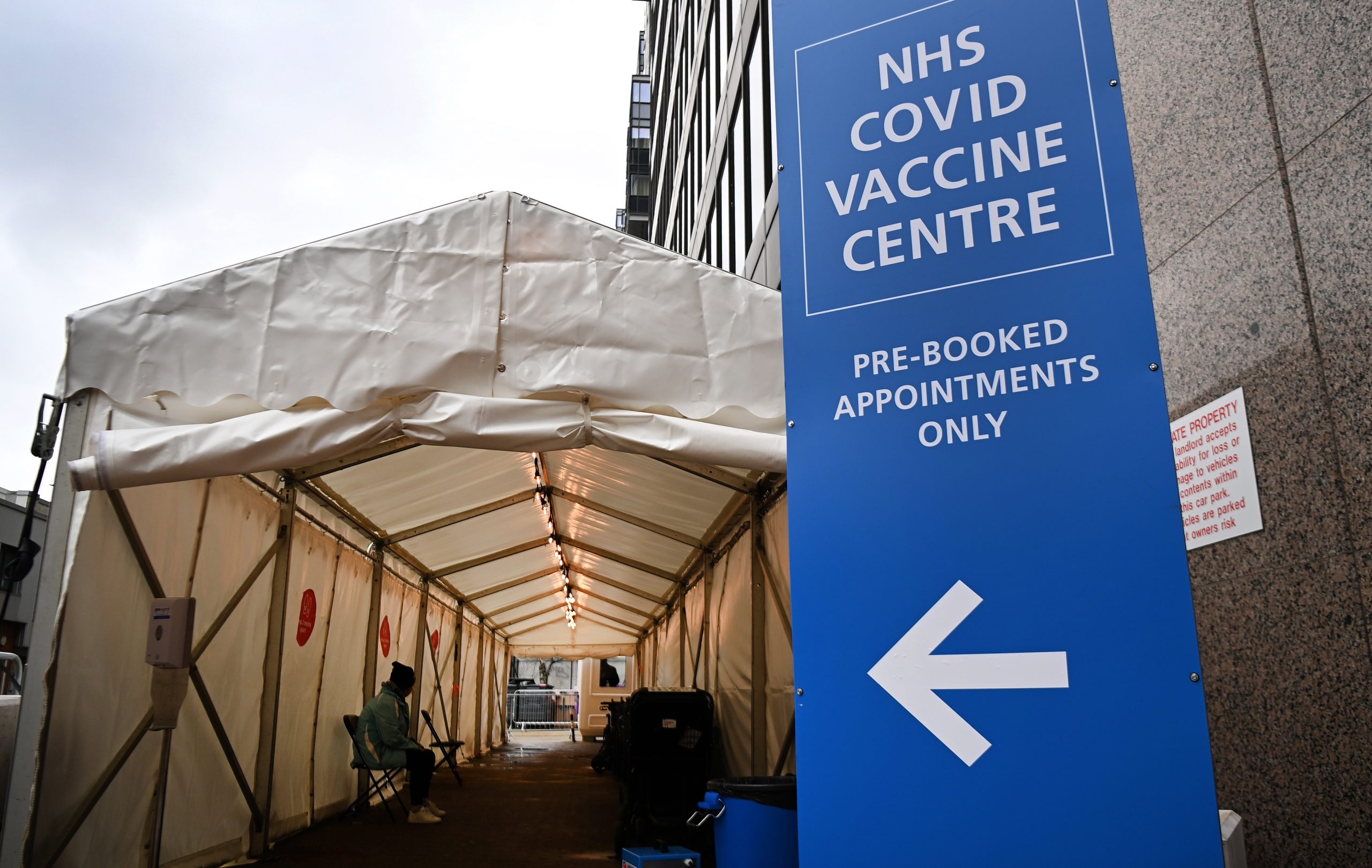 epa08971230 A Covid-19 vaccination centre at Wembley in London, Britain, 28 January 2021. Britain's national health service (NHS) is coming under severe pressure as Covid-19 hospital admissions are not falling fast enough across the UK. Over one thousand people are dying each day from the disease.  EPA/ANDY RAIN