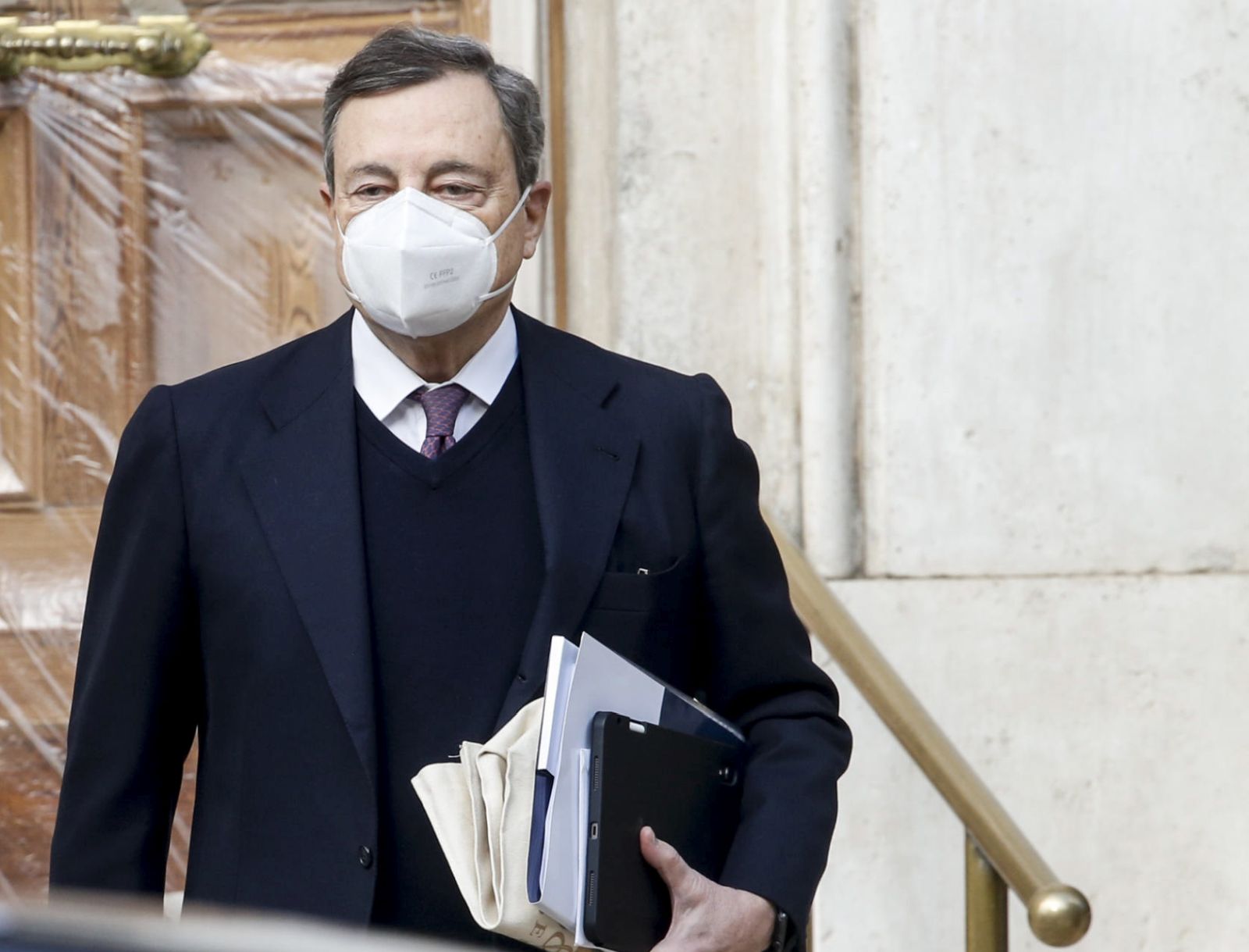 epa08981663 Mario Draghi, former president of the European Central Bank (ECB), leaves his home in Rome, Italy, 02 February 2021. According to media reports quoting party sources, the Italia Viva (IV) party, which pulled out of the ruling coalition leading to the collaplse of Giuseppe Conte's government, would like to see Draghi become prime minister.  EPA/FABIO FRUSTACI