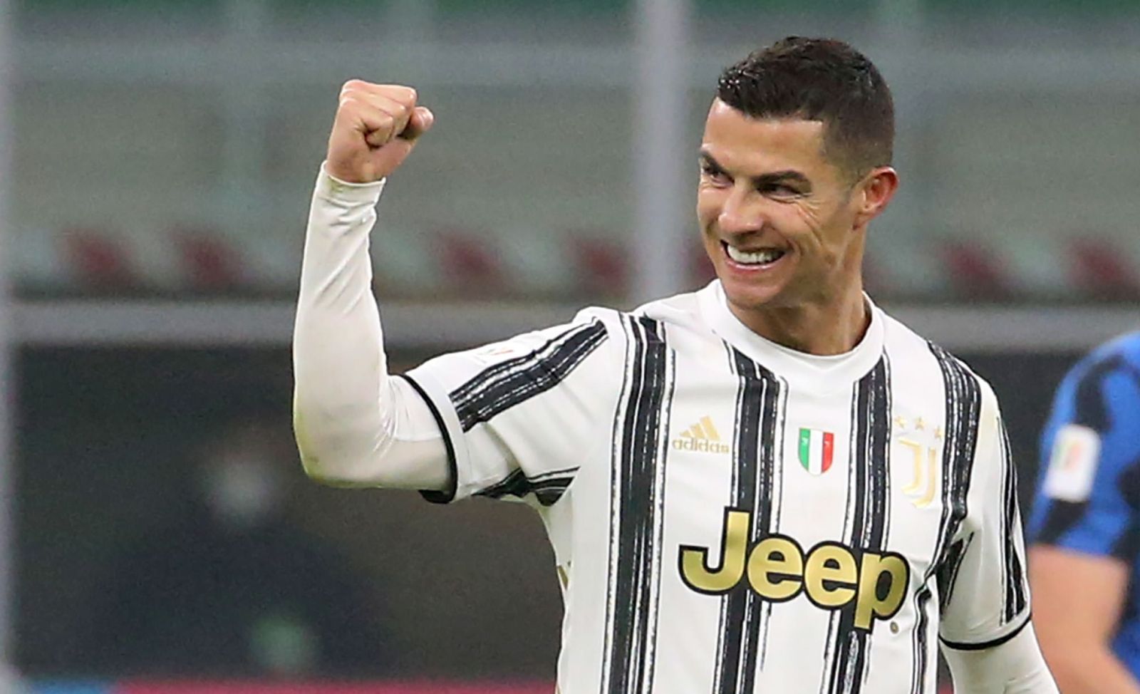 epa08982555 Juventus’ Cristiano Ronaldo celebrates after scoring the 1-2 goal during the Italy Cup semifinal first leg soccer match between FC Inter and Juventus FC at Giuseppe Meazza stadium in Milan, Italy, 02 February 2021.  EPA/MATTEO BAZZI