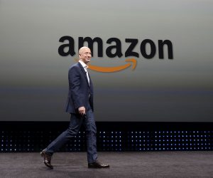 epa08982630 (FILE) - Amazon CEO Jeff Bezos walking on stage at a press conference where he introduced new Kindle products such as the Kindle Paperwhite Wi-Fi + 3G, the Kindle Fire HD and new programs and innovations for the wireless tablets at Santa Monica Airport in Santa Monica, California, USA, 06 September 2012 (Reissued 02 February 2021). Jeff Bezos will step down as CEO of Amazon and will become the executive chair of Amazon’s board by the third quarter (Q3). Amazon Web Services (AWS) CEO Andy Jassy will become Amazon's new CEO.  EPA/MICHAEL NELSON *** Local Caption *** 54601700