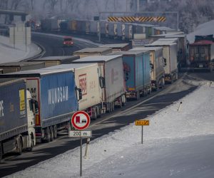 epa09014005 Trucks stand in the about 30km-long-tailback on highway D8 in direction of German border near Usti nad Labem, Czech Republic, 15 February 2021. Germany reinstated temporary entry bans and border controls from Czech Republic due to growing numbers of coronavirus variant cases in the Czech country. Starting from 14 February, stricter entry rules apply to the German border with the Czech Republic and the Austrian state of Tyrol. On first working day tailbacks of trucks created in directions of German borders across the country.  EPA/MARTIN DIVISEK