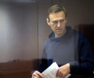 epa09015512 A still image taken from a handout video footage made available by the press service of the Babushkinsky district court shows Russian opposition leader Alexei Navalny inside a glass cage prior to a hearing of a case on slander charges in Moscow, Russia, 16 February 2021. In June 2020 the Russian Investigative Committee opened a criminal case against Alexei Navalny on charges of slander against WWII veteran Ignat Artemenko after Navalny's comment about a video promoting the amendments to the Russian Constitution.  EPA/BABUSHKINSKY DISTRICT COURT PRES -- MANDATORY CREDIT -- BEST QUALITY AVAILABLE -- HANDOUT EDITORIAL USE ONLY/NO SALES