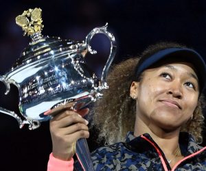 epaselect epa09025505 Naomi Osaka of Japan holds the trophy after winning the women's singles final against Jennifer Brady of the United States on day 13 of the Australian Open tennis tournament at Rod Laver Arena in Melbourne, Australia, 20 February 2021.  EPA/DAVE HUNT  AUSTRALIA AND NEW ZEALAND OUT