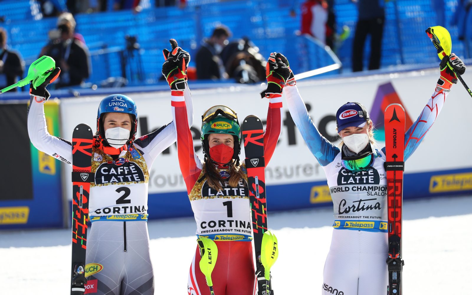 epa09025857 (L-R) Second placed Petra Vlhova of Slovakia, winner Katharina Liensberger of Austria and third placed Mikaela Shiffrin of the USA celebrate during the Women's Slalom race at the FIS Alpine Skiing World Championships in Cortina d'Ampezzo, Italy, 20 February 2021.  EPA/ANDREA SOLERO