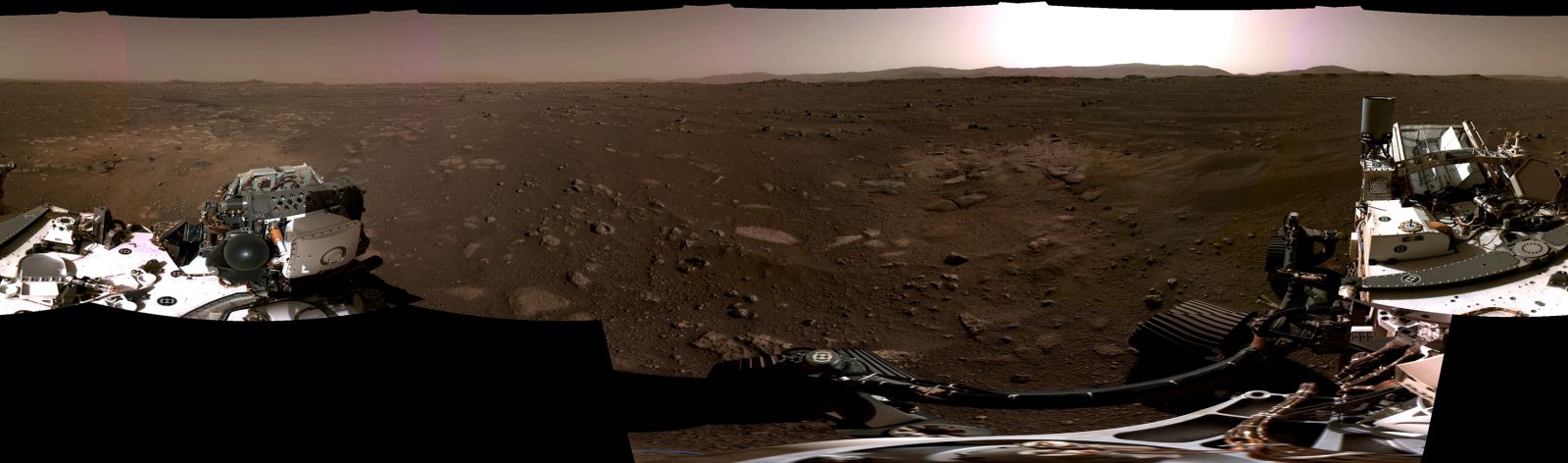 epa09030191 A handout photo made available by NASA shows This panorama, taken on 20 February  2021 (Issued on 22 February 2021), by the Navigation Cameras, or Navcams, aboard NASA’s Perseverance Mars rover, was stitched together from six individual images after they were sent back to Earth. A key objective for Perseverance's mission on Mars is astrobiology, including the search for signs of ancient microbial life. The rover will characterize the planet's geology and past climate, pave the way for human exploration of the Red Planet, and be the first mission to collect and cache Martian rock and regolith.  EPA/NASA/JPL-Caltech HANDOUT  HANDOUT EDITORIAL USE ONLY/NO SALES