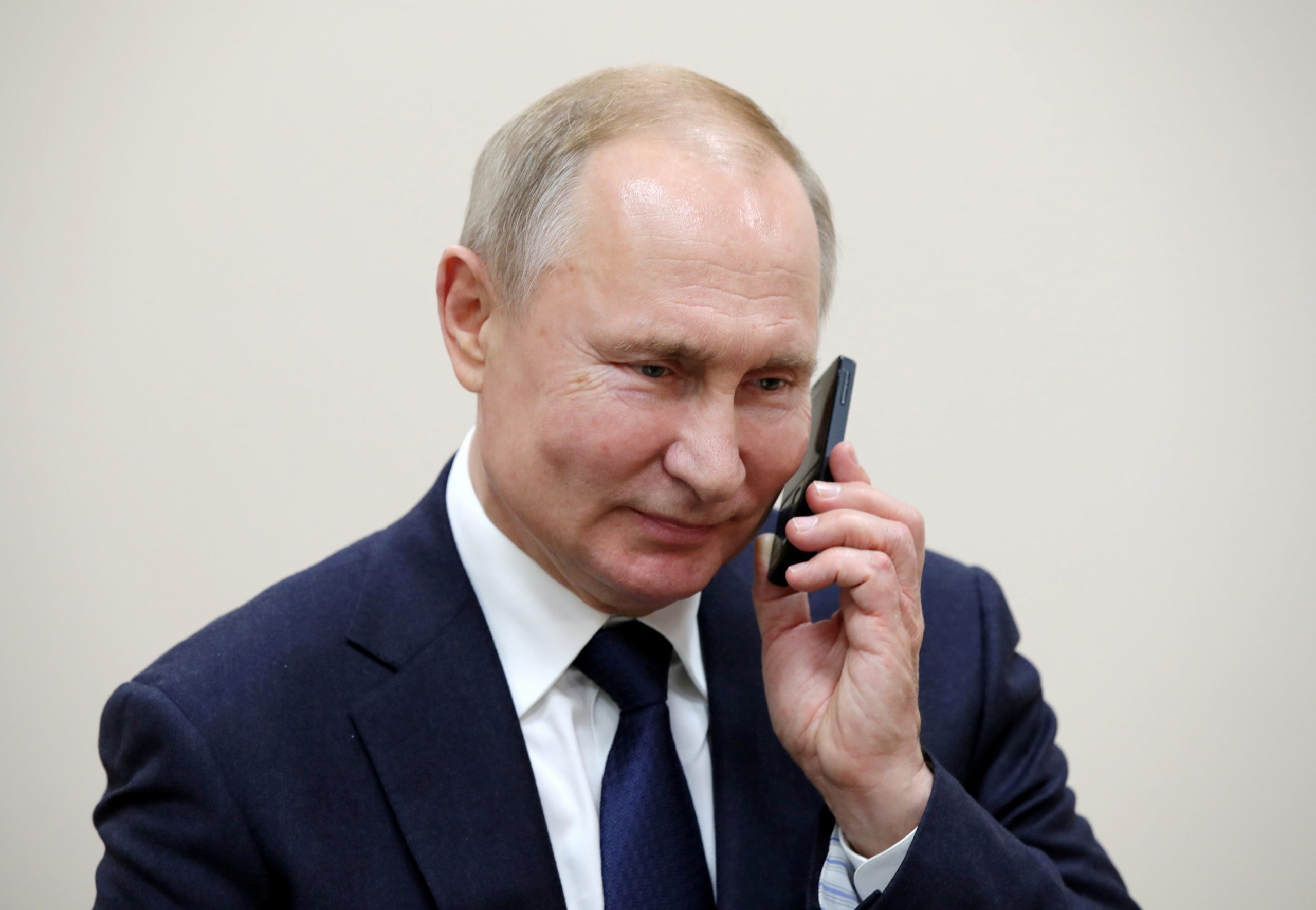FILE PHOTO: Russian President Vladimir Putin talks on the phone in the settlement of Enem FILE PHOTO: Russian President Vladimir Putin talks on the phone in the settlement of Enem, Republic of Adygea, Russia December 23, 2019. Sputnik/Mikhail Klimentyev/Kremlin via REUTERS ATTENTION EDITORS - THIS IMAGE WAS PROVIDED BY A THIRD PARTY./File Photo Sputnik Photo Agency