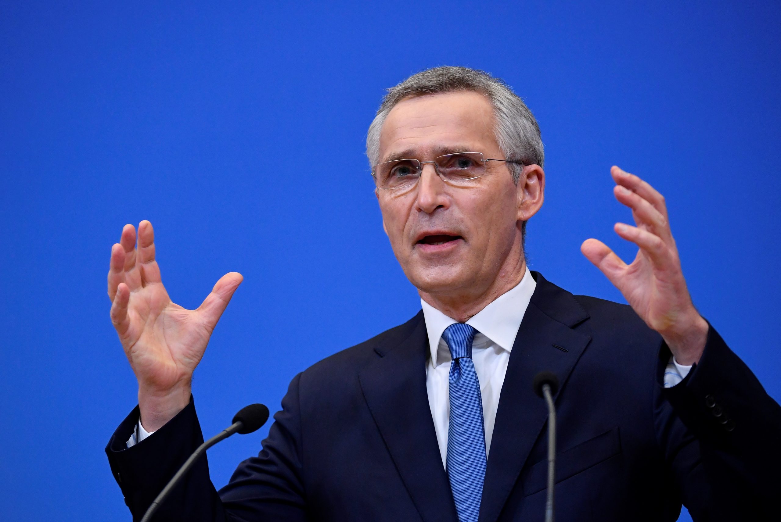 epa09019387 NATO Secretary General Jens Stoltenberg gestures as he addresses a press conference following a virtual meeting of defence ministers at NATO headquarters in Brussels, Belgium, on 17 February 2021.  EPA/JOHN THYS / POOL