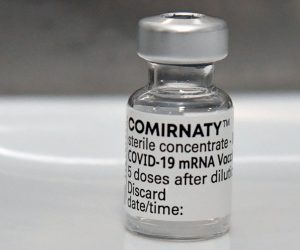 epa09030531 A vial of the Comirnaty BNT162b2 (mRNA) Pfizer Covid 19 vaccine at the COVID-19 surge centre in Canberra, Australia, 23 February 2021. Australia's deputy chief medical officer has heralded the start of the nation's vaccination rollout as a 'milestone' in the fight against COVID-19.  EPA/MICK TSIKAS  AUSTRALIA AND NEW ZEALAND OUT