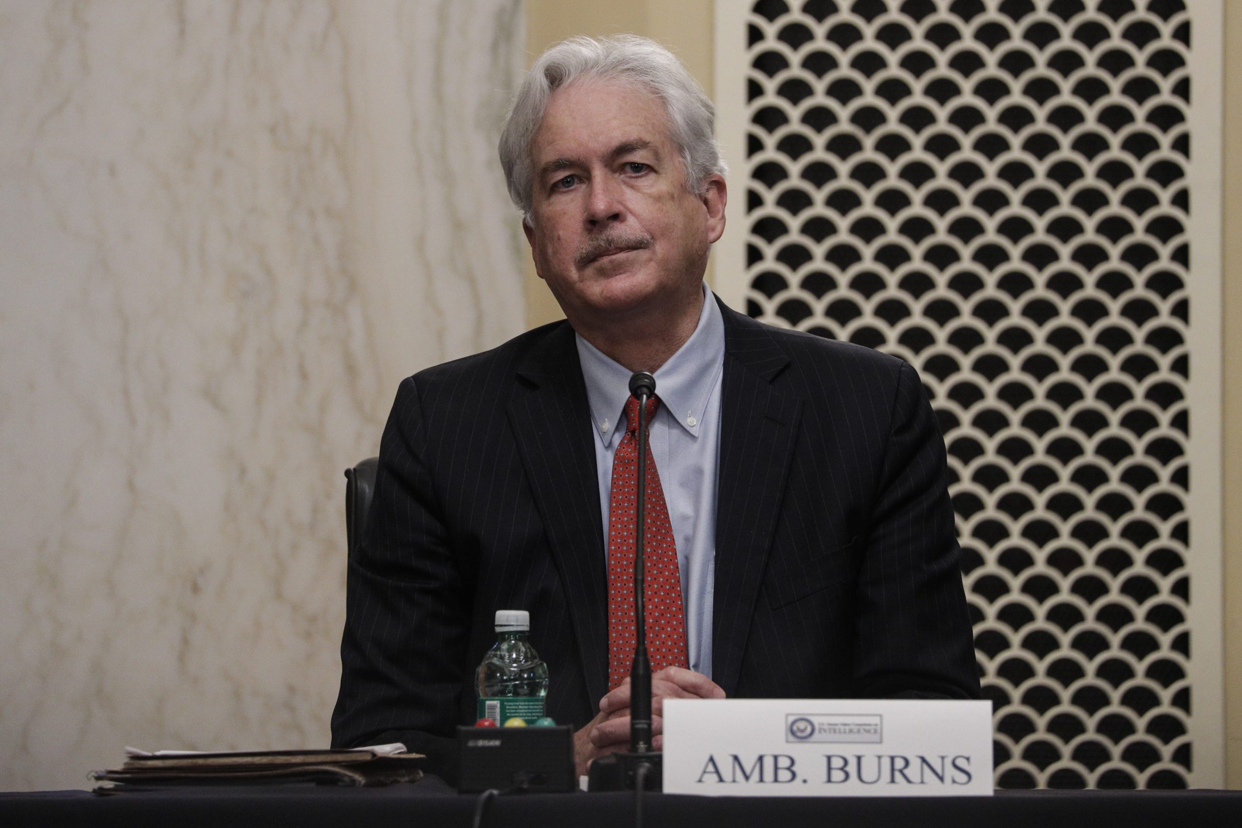 epa09033706 William Burns is seated to testify before a Senate Intelligence Committee hearing on his nomination to be director of the Central Intelligence Agency (CIA) on Capitol Hill in Washington, DC, USA, 24 February 2021.  EPA/TOM BRENNER / POOL