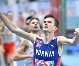 epa09055416 Jakob Ingebrigtsen (R) of Norway and Marcin Lewandowski (L) of Poland react after the men's 1500m at the 36th European Athletics Indoor Championships at the Arena Torun, in Torun, north-central Poland, 05 March 2021.  Ingebrigtsen finished in first place but was disqualified.  EPA/Leszek Szymanski POLAND OUT