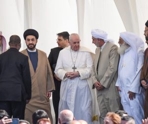 epa09055855 Pope Francis (C) attends a interreligious meeting at the Plain of Ur, Nassirya, Iraq, 06 March 2021. Pope Francis is visiting Iraq for the Apostolic Journey from 05 to 08 March 2021.  EPA/ALESSANDRO DI MEO