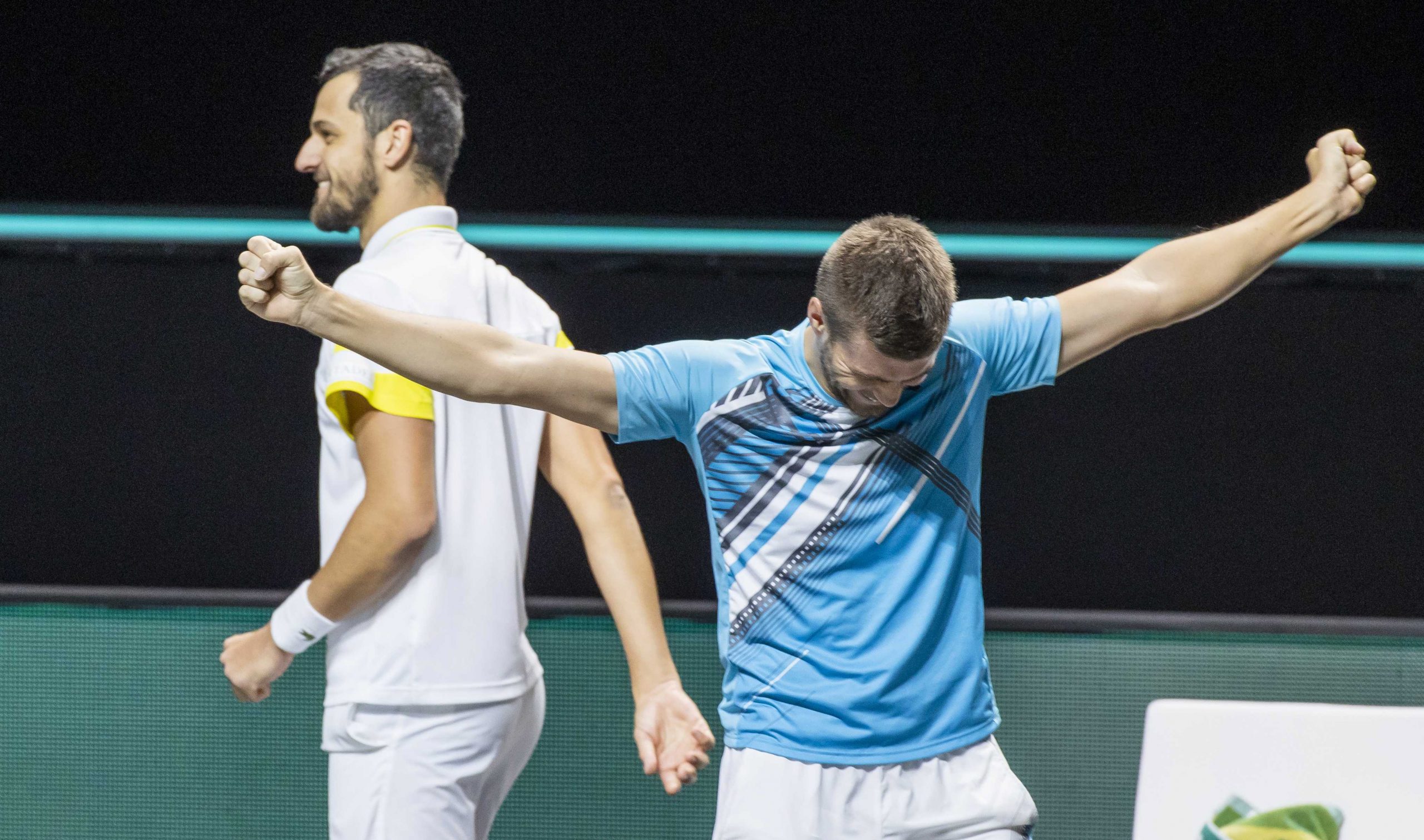 epa09059140 Nicola Mektic and Mate Pavic (L) of Croatia celebrate winning the doubles final against Kevin Krawietz of Germany and Horia Tecau  of Romania at the ABN AMRO World Tennis Tournament in Rotterdam, Netherlands, 07 March 2021.  EPA/Koen Suyk