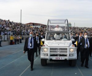 epa09059523 Pope Francis (C) ride the Papal Mobil as he arrives to celebrate the Holy Mass at the 'Franso Hariri' Stadium in Erbil, Iraq, 07 March 2021. Pope Francis began on 05 March a three-day official visit in Iraq, the first papal visit to this country affected throughout the years by war, insecurity and lately COVID-19 Coronavirus pandemic.  EPA/VATICAN MEDIA HANDOUT  HANDOUT EDITORIAL USE ONLY/NO SALES