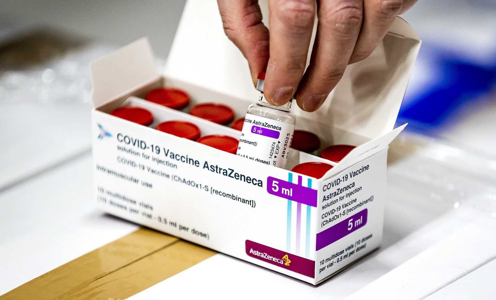epa09074881 (FILE) - A vial of AstraZeneca's Covid-19 vaccine stored in Movianto in Oss, The Netherlands, 12 February 2021 (reissued 14 March 2021). The Dutch health ministry on 14 March 2021 said it was suspending the AstraZeneca vaccine rollout, just days after pressing ahead with its use.  EPA/Remko de Waal