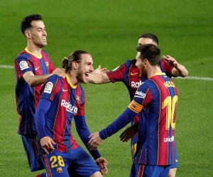 epa09077123 FC Barcelona's defender Oscar Mingueza (2-L) celebrates with teammates after scoring the 3-1 goal during the Spanish LaLiga soccer match between FC Barcelona and SD Huesca held at Camp Nou stadium, in Barcelona, Catalonia, Spain, 15 March 2021.  EPA/Toni Albir