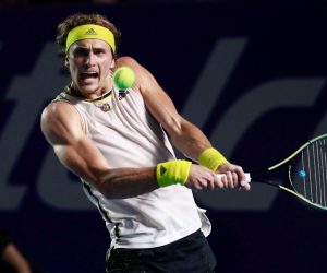 epa09077301 Alexander Zverev of Germany in action against Carlos Alcaraz of Spain during their match at the Mexican Open tennis tournament in Acapulco, Guerrero state, Mexico, 15 March 2021.  EPA/David Guzman