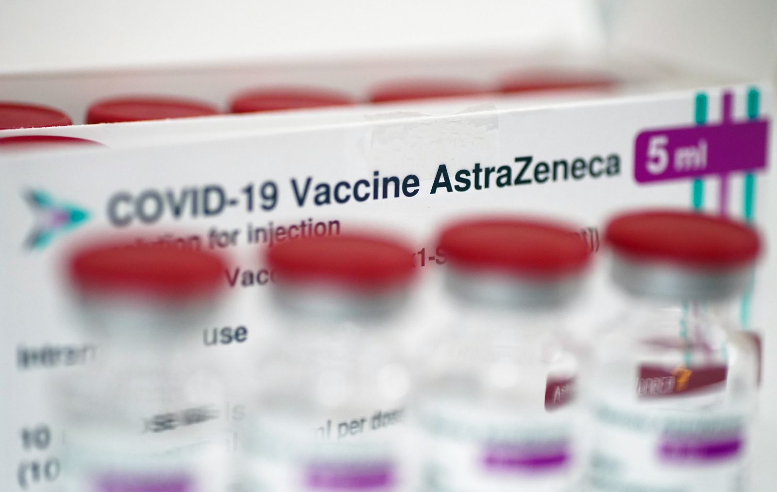 epa09084172 Vials of the AstraZeneca COVID-19 vaccine are displayed at the Southern Hospital in Warsaw, 19 March 2021. Poland has received a new batch of 65,000 coronavirus vaccine doses from the Anglo-Swedish firm AstraZeneca, with a further 72,000 expected next week. EU member countries reintroduce the AstraZeneca Covid-19 vaccine in their inoculation campaigns following the previous day's European Medicines Agency (EMA) announcement to uphold its approval of the vaccine. Some countries stopped giving the vaccine over fears there might be links between the vaccination against Covid-19 with the AstraZeneca vaccine and a rare number of blood clots.  EPA/Leszek Szymanski POLAND OUT