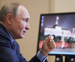 epa09090015 Russian President Vladimir Putin attends a meeting on the vaccination campaign against Covid-19, via video link at the Novo-Ogaryovo state residence outside Moscow, Russia, 22 March 2021.  EPA/ALEXEI DRUZHININ / KREMLIN POOL/SPUTNIK MANDATORY CREDIT
