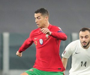 epa09094722 Portugal's Cristiano Ronaldo (L) fights for the ball with Azerbaijan's Elvin Badalov during the FIFA World Cup Qatar 2022 Group A qualifier match Portugal against Azerbaijan in Turin, Italy, 24 March 2021.  EPA/MIGUEL A. LOPES